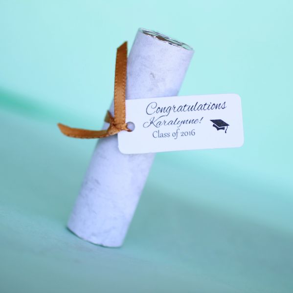 Graduation party favors, diploma mint rolls decorated with personalized tags