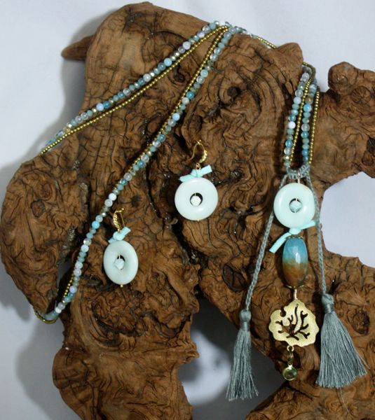 Light Aqua Hue Agate with a Druzy pendant accentuated with suede knot details and jeweled charm