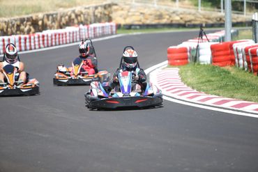 Friends racing during the day with 9hp and 15hp karts.