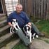 Harry relaxing at home with dogs.