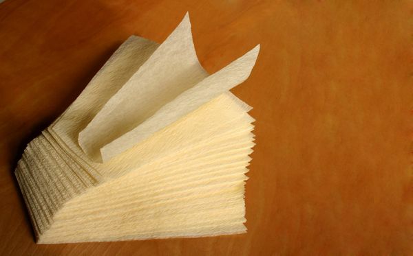 9 x 9 x 3.5 inch textured tamale parchment wrap (corn husk substitute); a triangular 9-inch sheet, corn-yellow, case of 1,000
