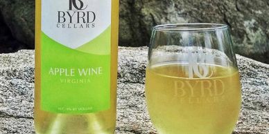 bottle of Byrd Cellars apple wine with glass