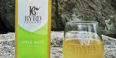 bottle of Byrd Cellars apple wine with glass