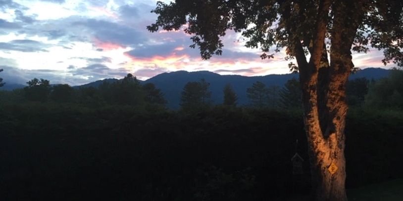 Sunset picture overlooking the Balsam Mountains from our property at Brookside Cottages.