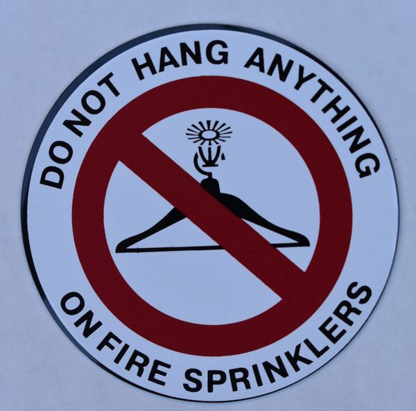 DO NOT HANG ANYTHING ON FIRE SPRINKLERS SIGN (ROUND CIRCLE SIGN