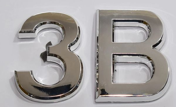 DOB SIGNS: 1 SIGN– SILVER (PLASTIC NUMBERS FOR MAIL BOXES IN NYC)