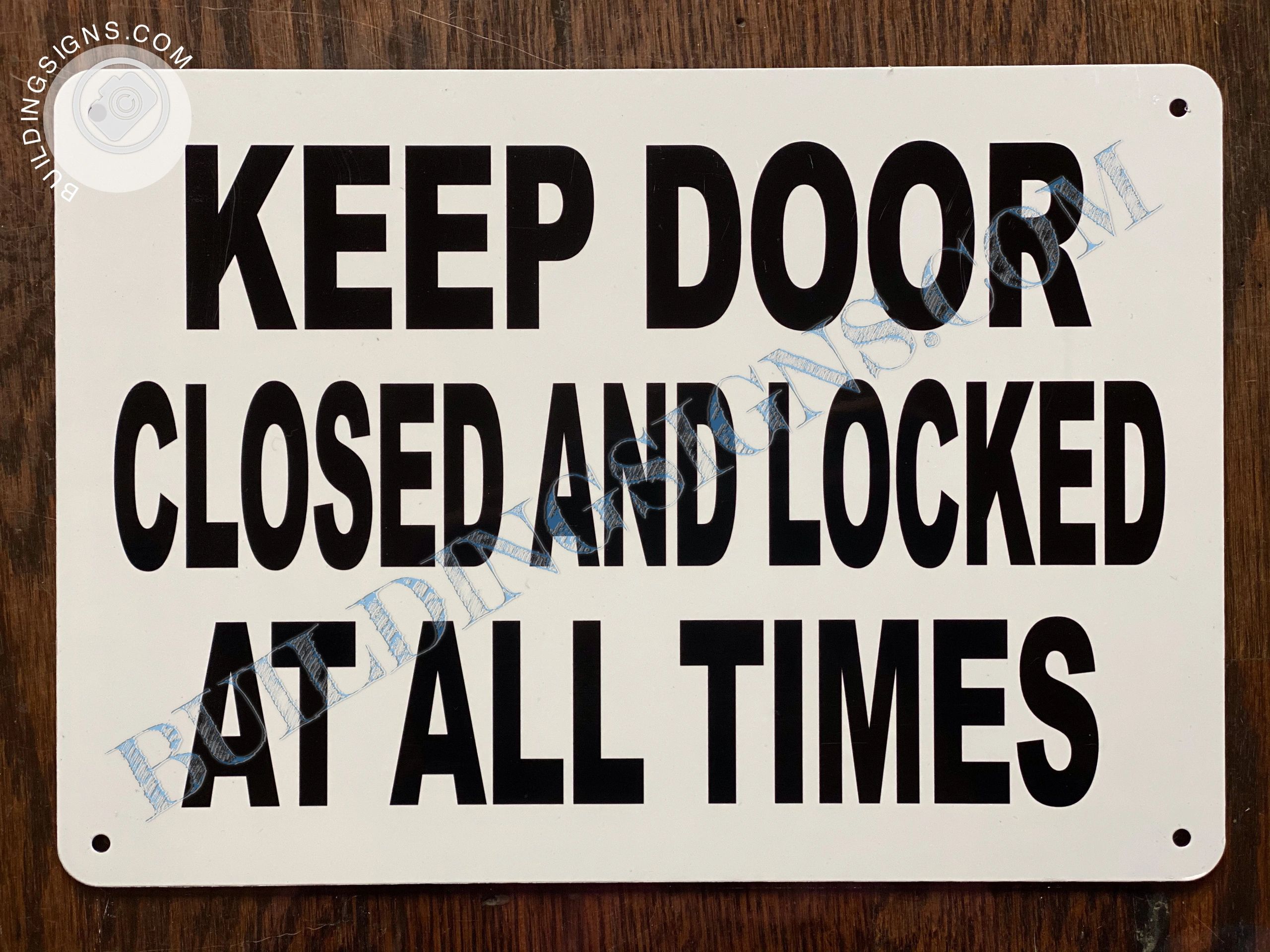 KEEP DOOR CLOSED AND LOCKED AT ALL TIMES SIGN HPD SIGNS THE