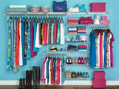 Organized closet with colorful clothes, shoes, and storage bins.