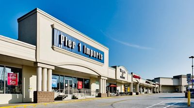 Blue sky and Pier 1 Imports retail store at One Mile West Shopping Center