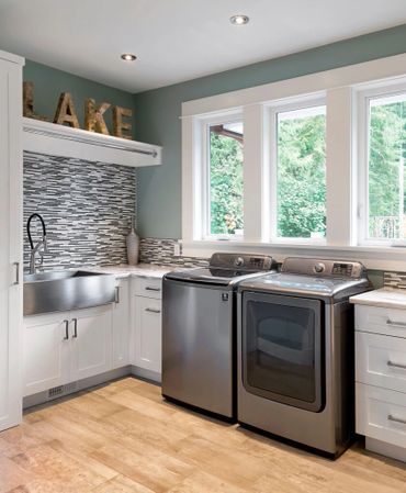 custom white laundry room cabinets stainless steel farmhouse sink shaker doors