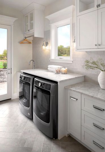 custom traditional laundry room painted white cabinets to ceiling shaker cup pull glass door latch 