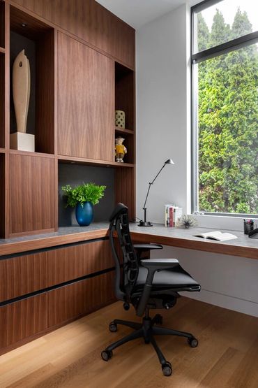 walnut modern slab door office cabinets desk integrated pull handles open shelves to ceiling