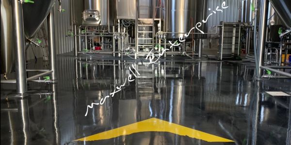 Brewery in Norman, Oklahoma. Decorative concrete - custom metallic epoxy flooring