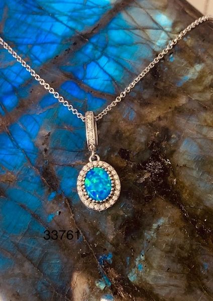 925 Sterling Silver Simulated Blue Opal Oval Drop Pendant - 33761-k5