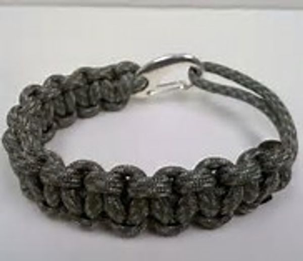 Black paracord bracelet with metal clasp.