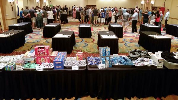 Snack station with multiple candy options at an event.