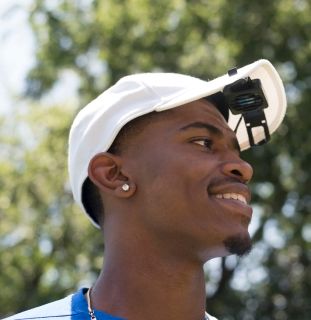 Hat with sales fan attached