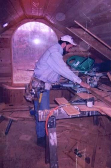 Attic renovation; with Western red cedar and sliding shelving units.