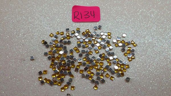 Rhinestone #R134 (2 mm gold square rhinestone)