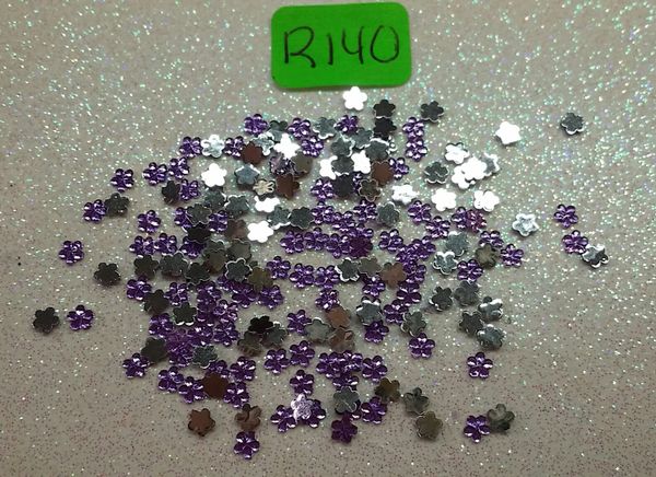 Rhinestone #R140 (2 mm purple flower rhinesto