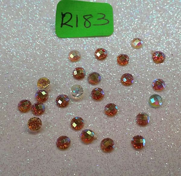 Rhinestone #R183 (3 mm gold Glitter stone)