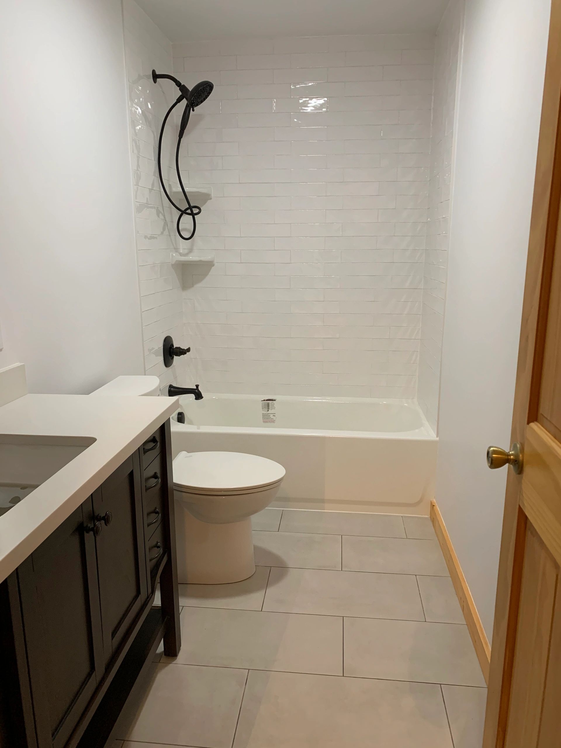 vaniy, toilet, tub, plumbing fixtures, floor and shower tile, baseboard installation, bathroom paint