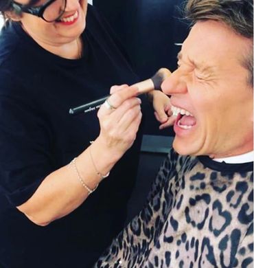 Celebrity MUA Lisa Mejuto having fun doing Good Morning Britiain host Ben Shepherd's makeup