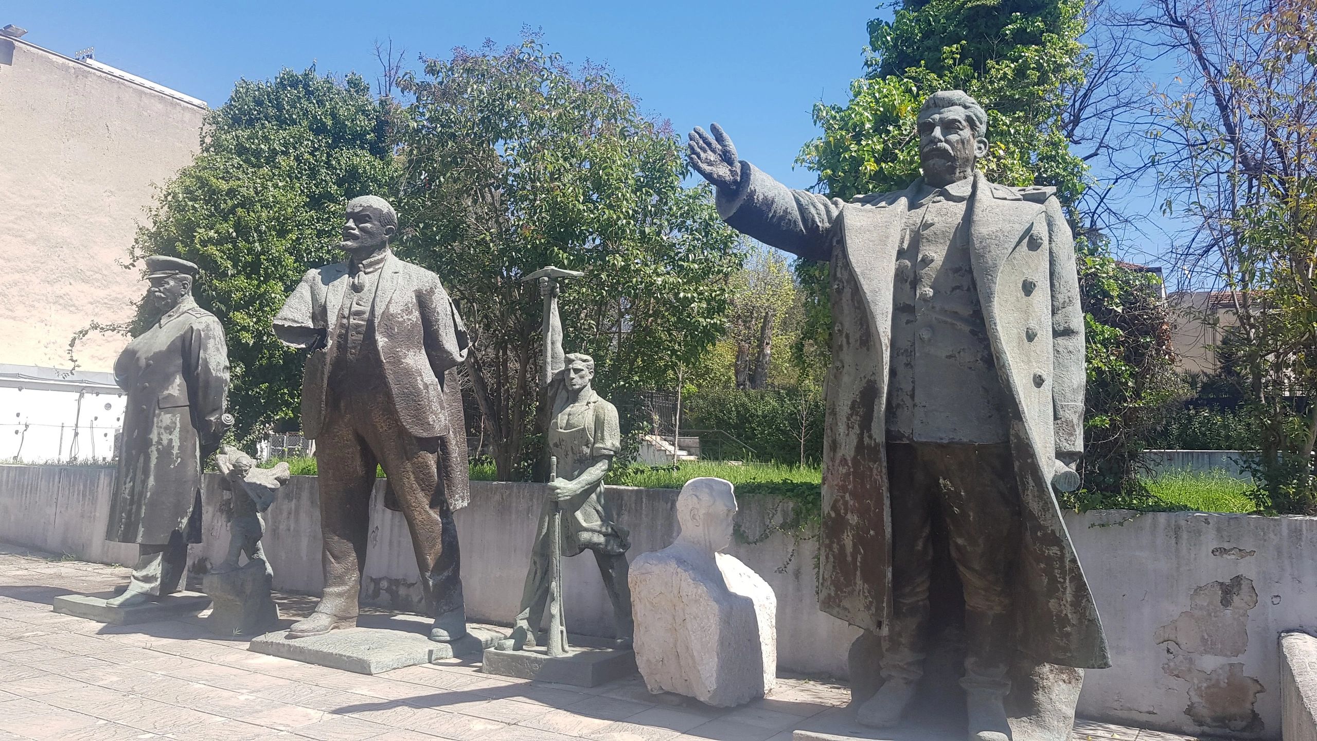 Statues from communist era behind the national gallery of arts. #CommunistTourTirana #AlbaniaHistory