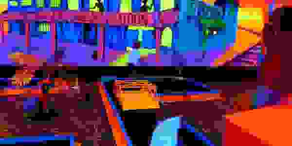 Black light indoor mini golf course lit up.
