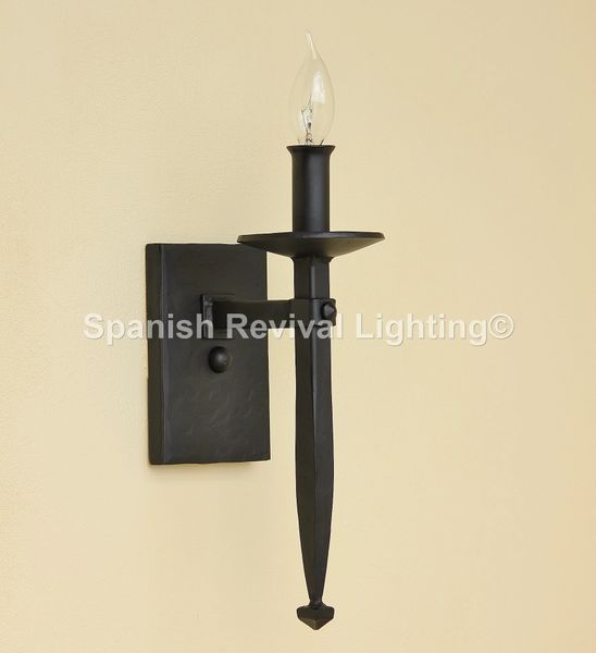 Spanish revival store wall sconces