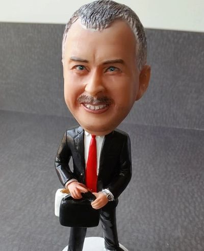 John Espley's bobblehead shows how he likes to use humor