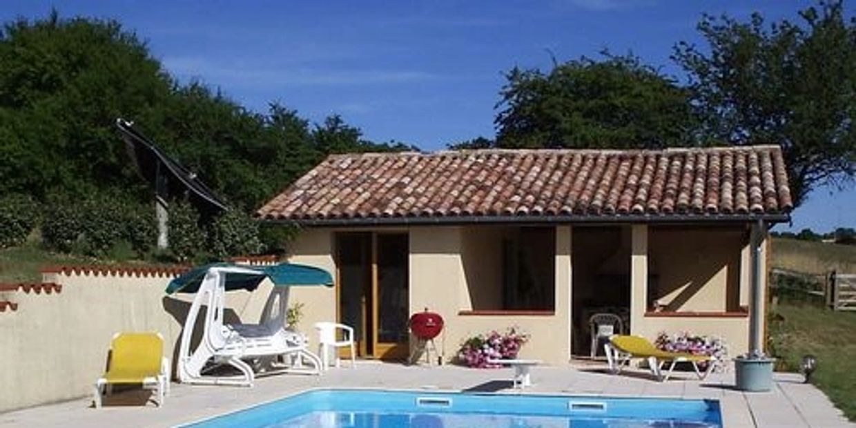 The Pool House at Castanet providing a shady dining area and a built in BBQ