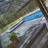 Image of a pool deck highlighting a power washing job completed by Mr. Scrub. 