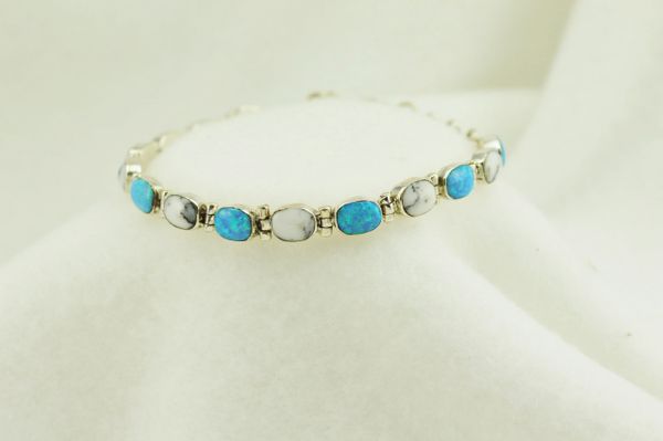 Sterling silver howlite and blue opal link 7.25" bracelet. B057