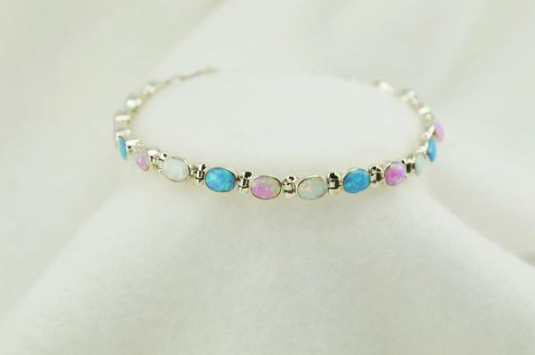 Sterling silver white, pink and blue opal oval link 7.25" bracelet. B081