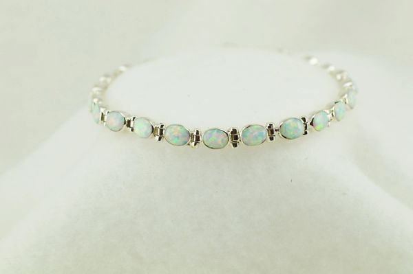 Sterling silver white opal oval link 7.25" bracelet. B087