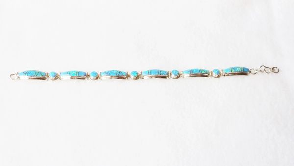 Sterling silver blue opal inlay 8.5" link bracelet. B001