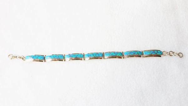 Sterling silver blue opal inlay 8.25" link bracelet. B003