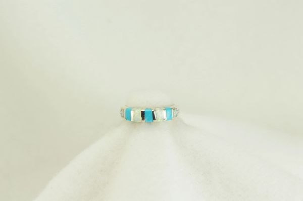 Sterling silver turquoise and white opal inlayl ring. R125