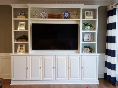 Entertainment Center with Flat Panel TV and Bookcase Display Shelves