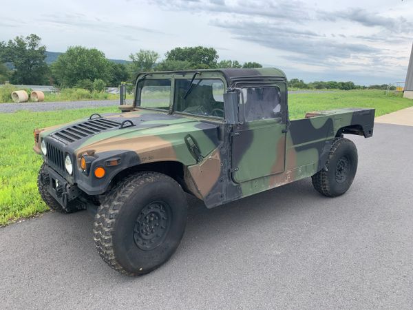 AM GENERAL CAMO HUMMER, 2-MAN WITH SOFT TOP ASSEMBLY.