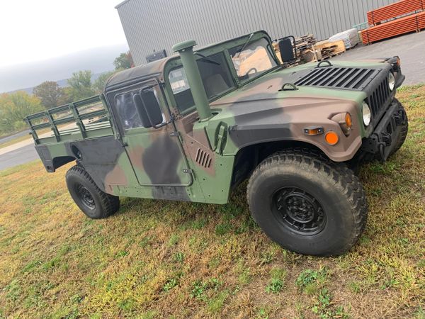 2005 AM GENERAL CAMO M1123 HUMMER, 2-MAN WITH SOFT TOP ASSEMBLY