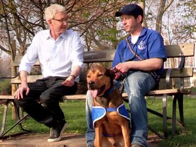 Dog Trainer Brian chatting to the late Paul O'Grady for an episode of For the love of Dogs. 

