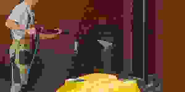 Pressure washing the exterior of the house