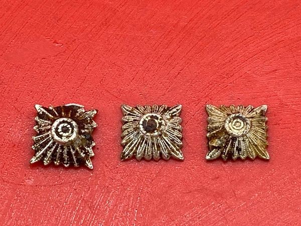 Group of 3 shoulder board silver rank pips which still retain some original colour,uniform remains worn by soldier of the 1st Panzer Army recovered near the River Don area outside the City of Rostov on Don attacked by them in 1941 near Stalingrad