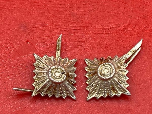 Pair of shoulder board silver rank pips which still retain all of there original colour and complete worn by soldier of the 1st Panzer Army recovered near the River Don area outside the City of Rostov on Don attacked by them in 1941 near Stalingrad