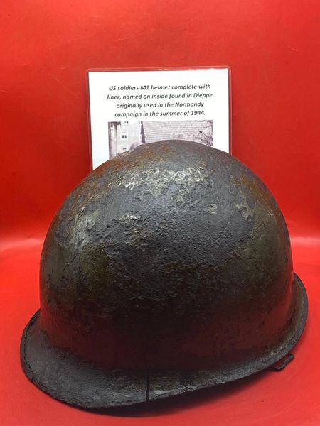Lovely condition US soldiers M1 helmet with original paintwork complete with liner, named on inside semi-relic condition found in Dieppe originally used in the Normandy campaign in the summer of 1944