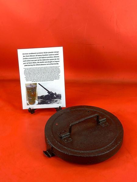 German cardboard container lid for powder charge for 21cm Morser 18 heavy howitzer recovered from Kriegsmarine coastal artillery position on the Atlantic wall defence system near the port of Saint Malo in France August 1944 battle