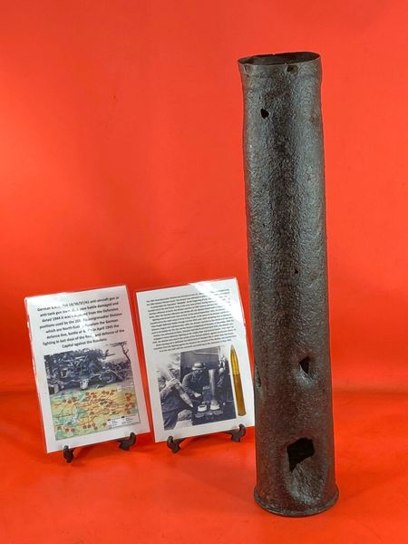 German steel made flak 88 anti-aircraft or anti-tank gun shell case with some markings and battle damage impact holes solid relic condition used by soldiers of the 20th Panzergrenadier Division recovered near Potsdam,battle of Berlin in April 1945