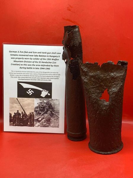 2 German shell cases one 3.7cm flak shell case,5cm anti-tank case both relic condition recovered near lake Balston in Hungary used by the 13th Waffen Mountain Division of the SS Handschar (1st Croatian) as this was the area defended by them during battle